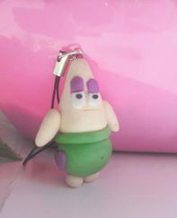 软陶手机链 小商品中的工艺情感，从蓝精灵看动漫开发新商机